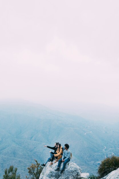 Hikers sitting on rock