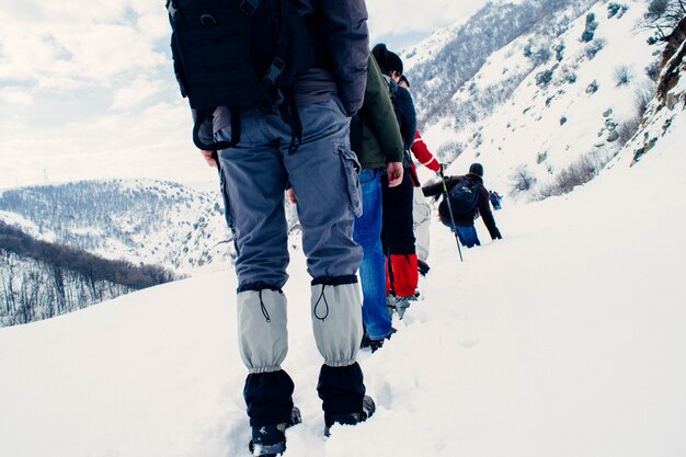 Hikers on a slippery mountain