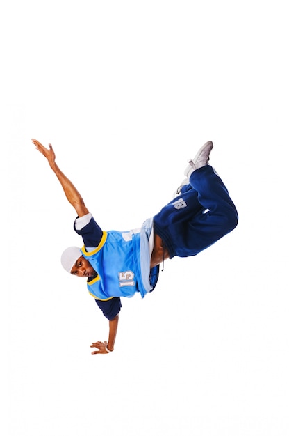 Free photo hip-hop young man making cool move on white background