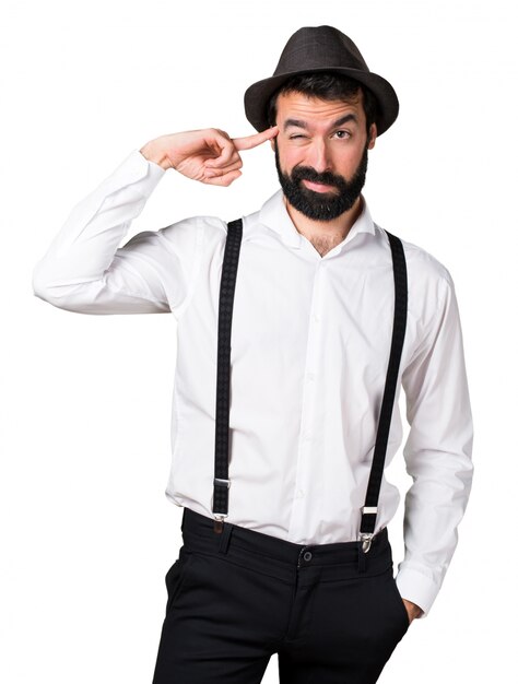 Hipster man with beard making crazy gesture