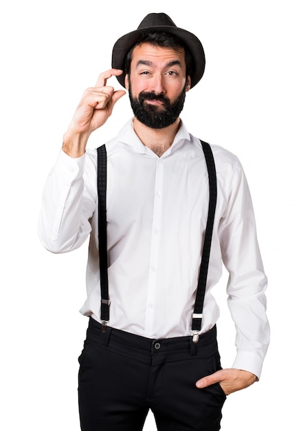 Free Photo hipster man with beard making tiny sign