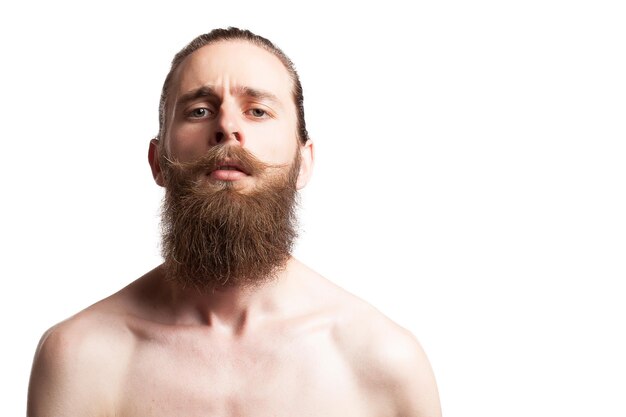 Hipster wearing a long beard on white background in studio photo