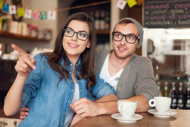 Hipster young couple at cafe 
