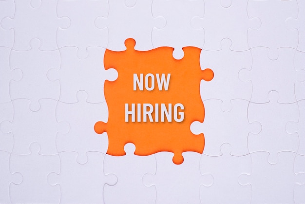 Hiring concept with puzzle pieces