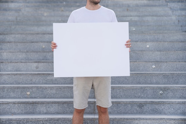 Holding poster