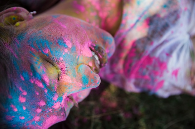 Free Photo holi color over the woman's face