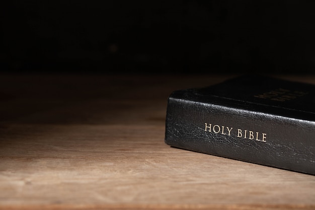 Holy Bible on a wooden table