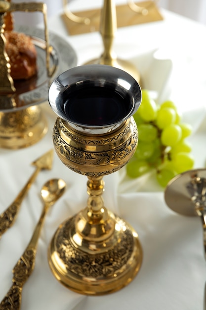 Free photo holy communion with wine chalice high angle