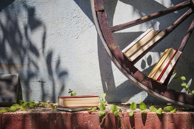 Free Photo home exterior with garden and wooden wheel