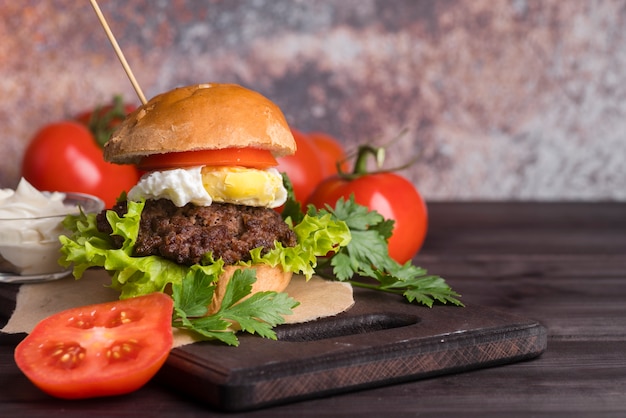 Home made burger with delicious tomatoes