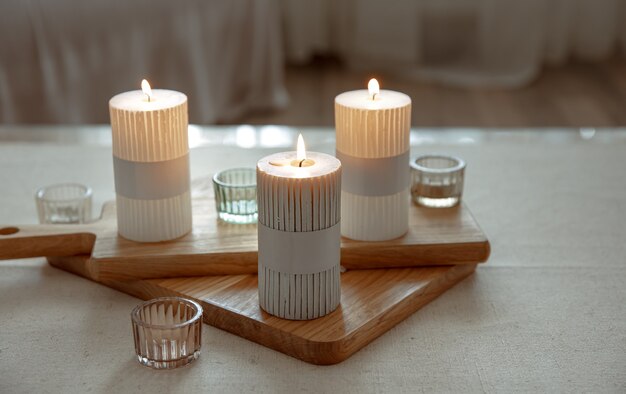 Free photo home still life with burning candles as home decor details.