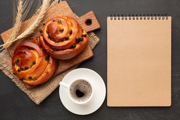 Homemade bagels and notepad flat lay