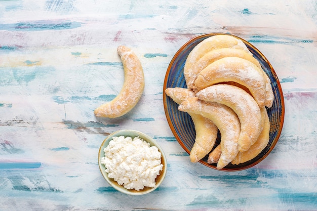 Homemade banana shaped cookies with cottage cheese filling.