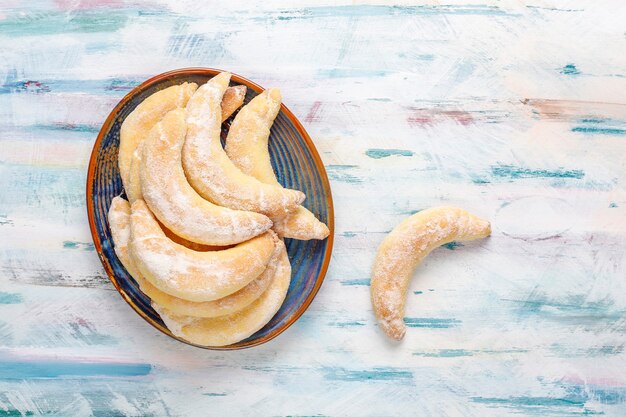 Homemade banana shaped cookies with cottage cheese filling.