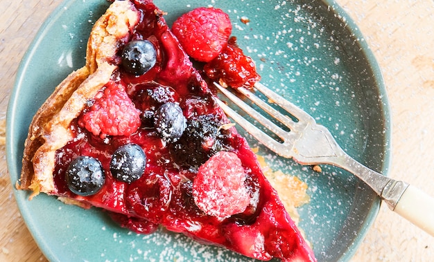 Free photo homemade berry pie on a wooden table