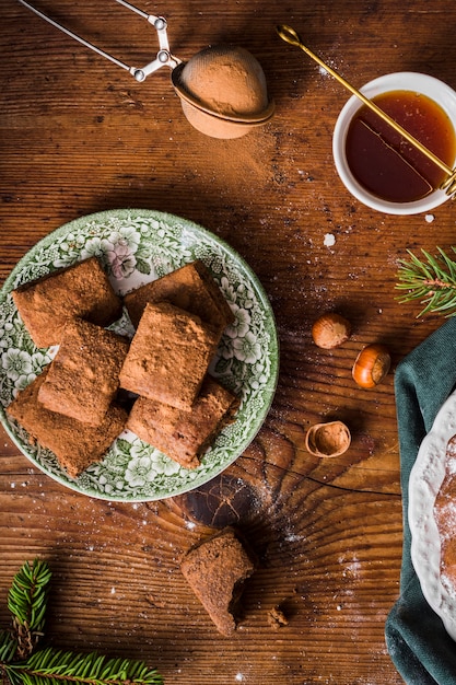 Free photo homemade brownies and honey flat lay