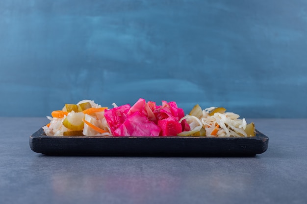 Free photo homemade cabbage pickle. chopped and sauerkraut on wooden board.