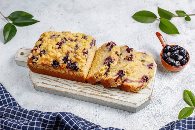 Free photo homemade delicious blueberry crumble cake with frozen blueberries,top view