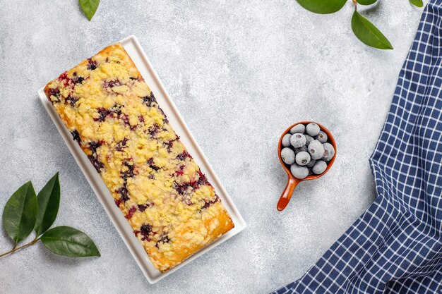 Homemade delicious blueberry crumble cake with frozen blueberries