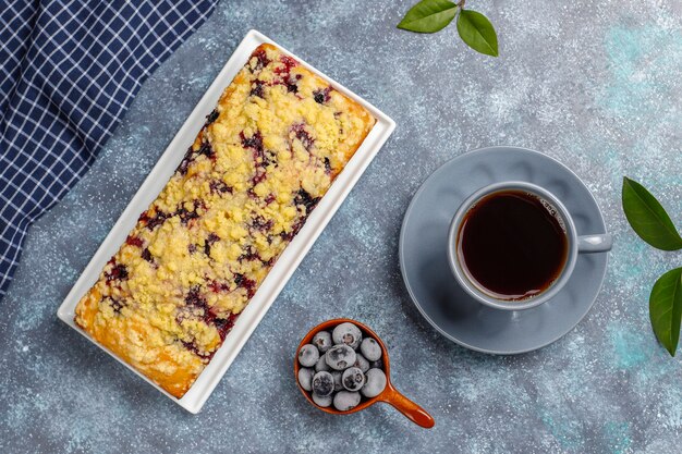 Homemade delicious blueberry crumble cake with frozen blueberries