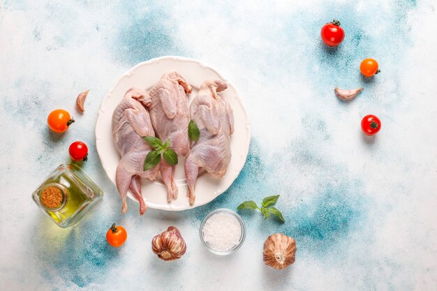 Homemade eco-friendly raw quails ready for cooking.