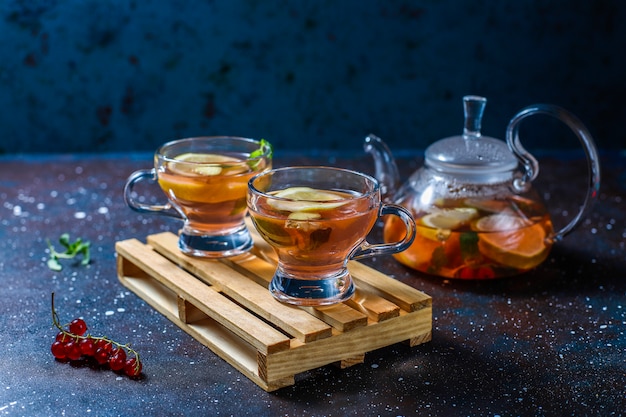 Homemade fruit and berry tea with mint.