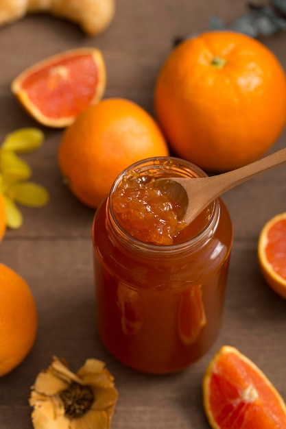 Homemade orange fruit butter and spoon