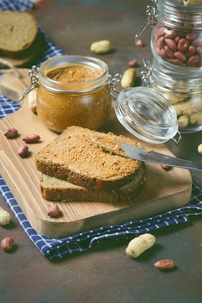 Free photo homemade organic creamy peanut butter in a jar