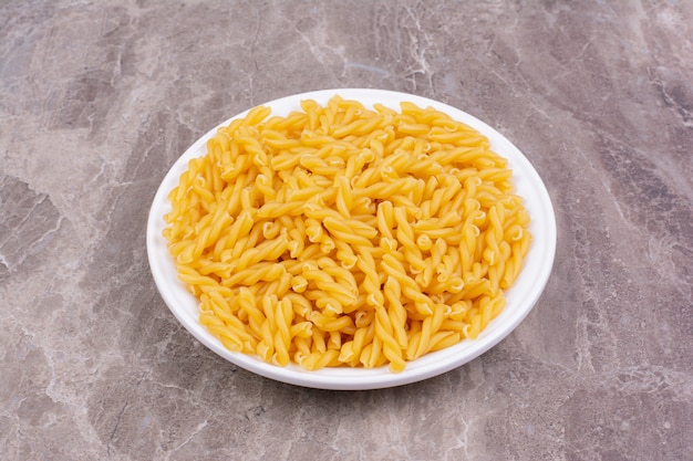 Homemade pastas in a white ceramic cup