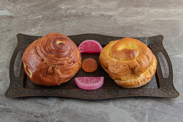 Homemade pastries and candies on metal tray