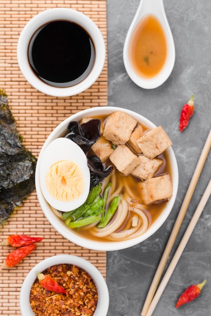 Homemade ramen soup with half of egg and soy sauce