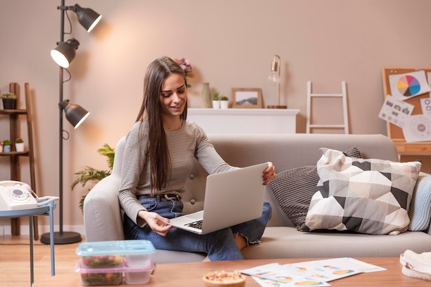 Homeworking from her laptop