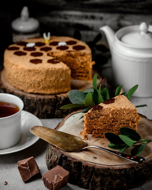 Honey cake with coffee on the table