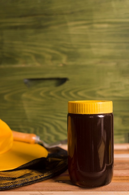 Free Photo honey jar with yellow cover