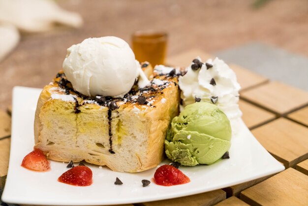 honey toasts with strawberry, vanilla and green tea ice-cream