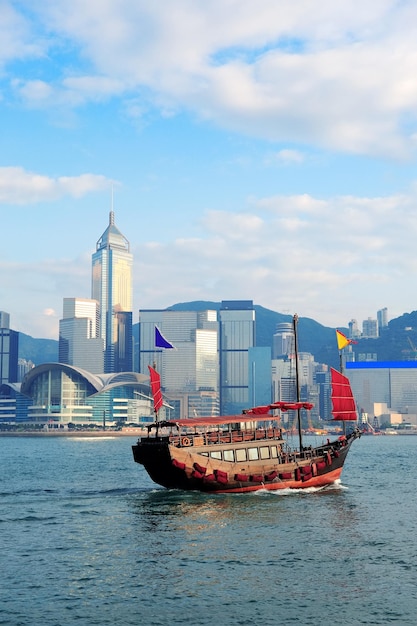 Free photo hong kong skyline with boats