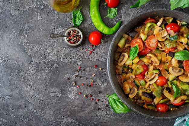 Free Photo hot spicy stew eggplant, sweet pepper, tomato, zucchini and mushrooms.