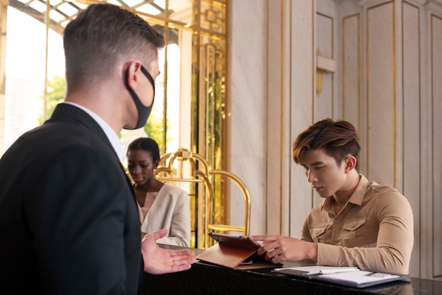 Hotel receptionist at work