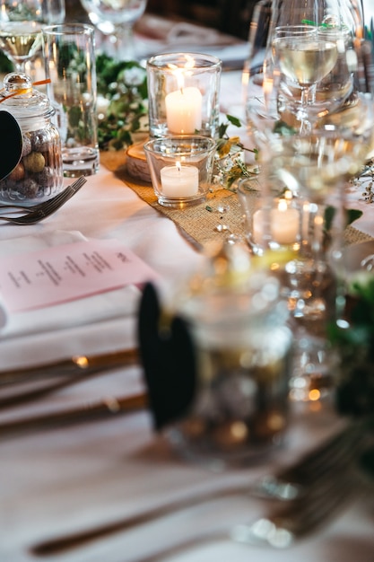 Huge decoration with candles on holiday table