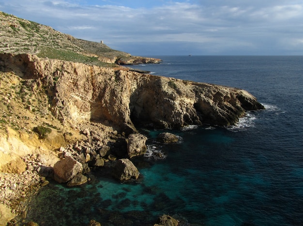 Huge rocky cliff on Lapsi coastline, Maltese Islands, Malta