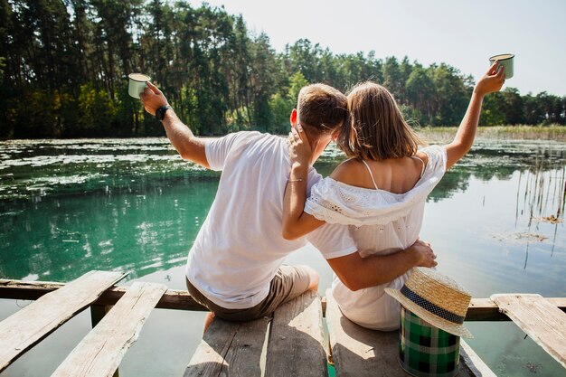 Hugging couple from behind shot