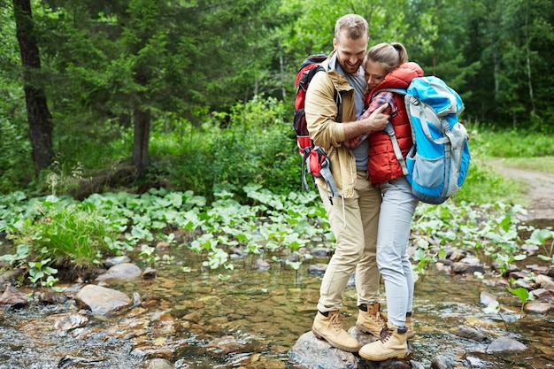 Free photo hugging travelers