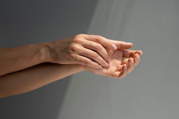 Human hands against clear background