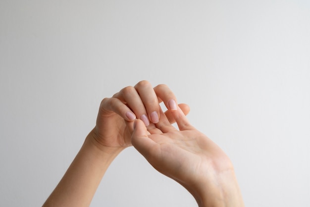 Human hands against clear background