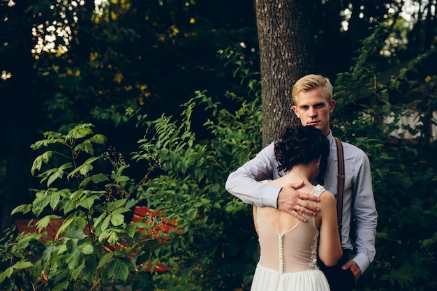 Free photo husband hugging her wife