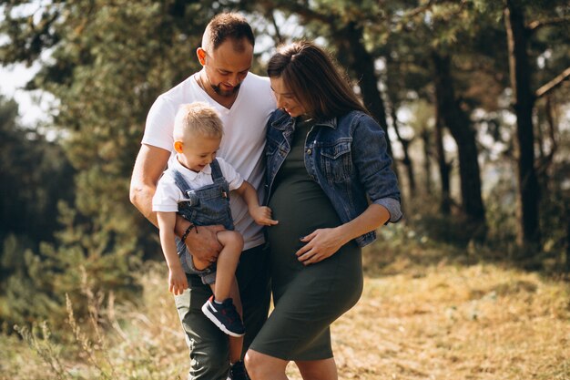 Husband with pregnant wife and their son