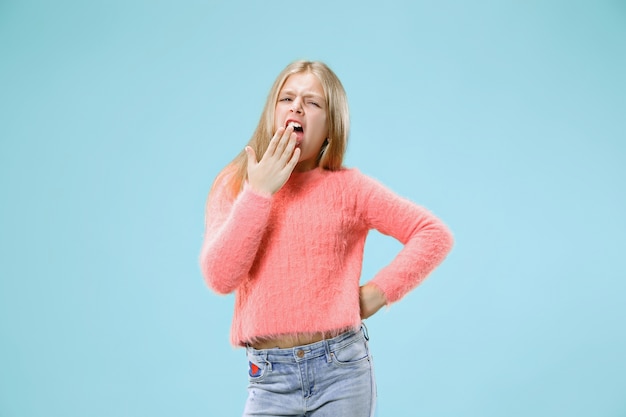 Free photo i am tired of everything. bored woman. boring, dull, tedious concept. young pretty caucasian emotional girl. human emotions, facial expression concept. studio isolated on trendy background