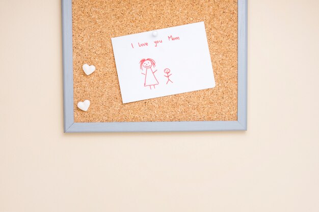 Free photo i love you mom inscription with drawing on paper