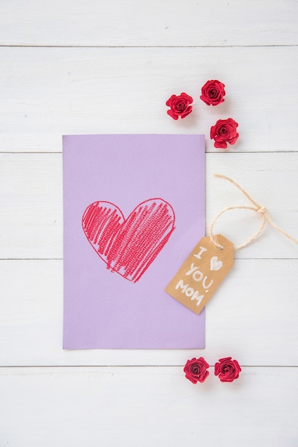 Free Photo i love you mom inscription with heart drawing 