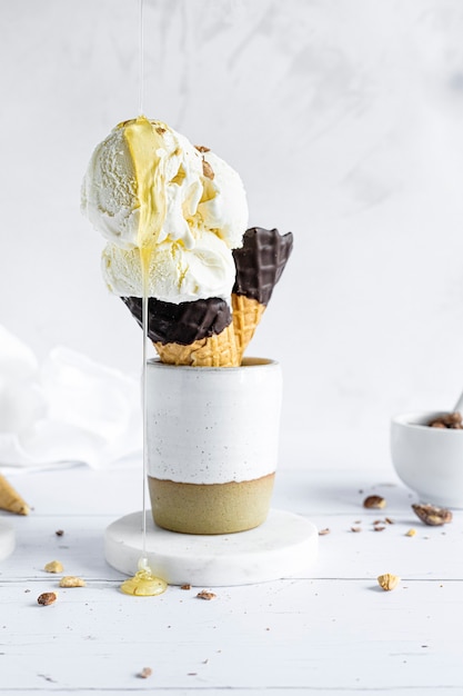 Free photo ice cream cone with caramel sauce food photography